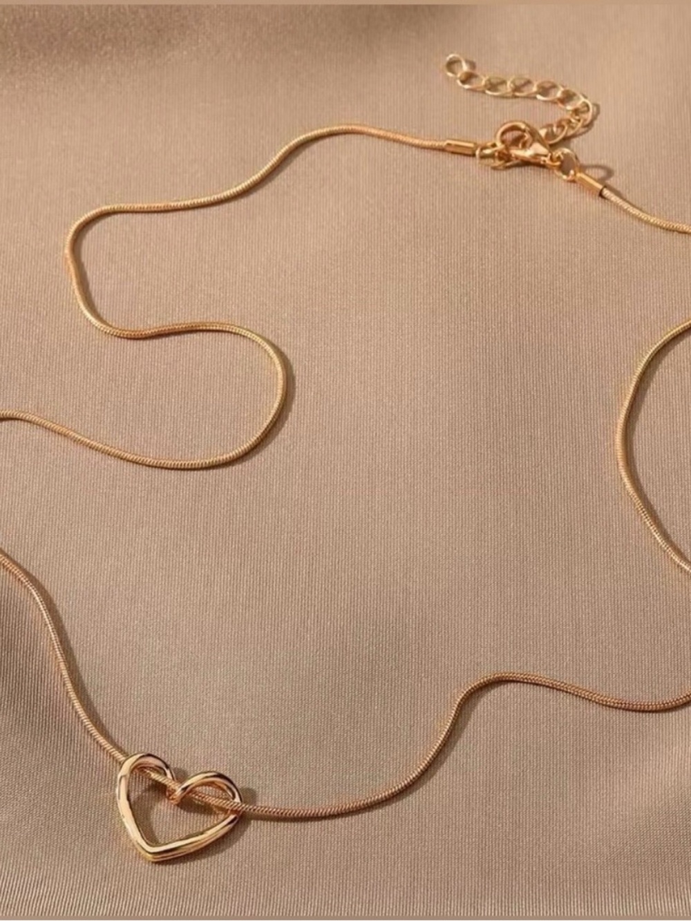 Elegant Polished Gold Heart Knot Necklace